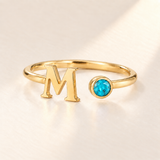 Custom Open Birthstone Initial Ring, gold december birthstone variant image; ivory background