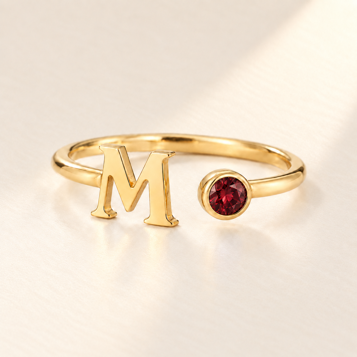Custom Open Birthstone Initial Ring, gold-january birthstone variant image; ivory background