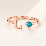 Custom Open Birthstone Initial Ring, rose gold december birthstone variant image; ivory background