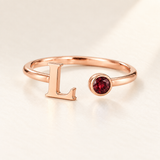 Custom Open Birthstone Initial Ring, rose-gold-january birthstone variant image; ivory background