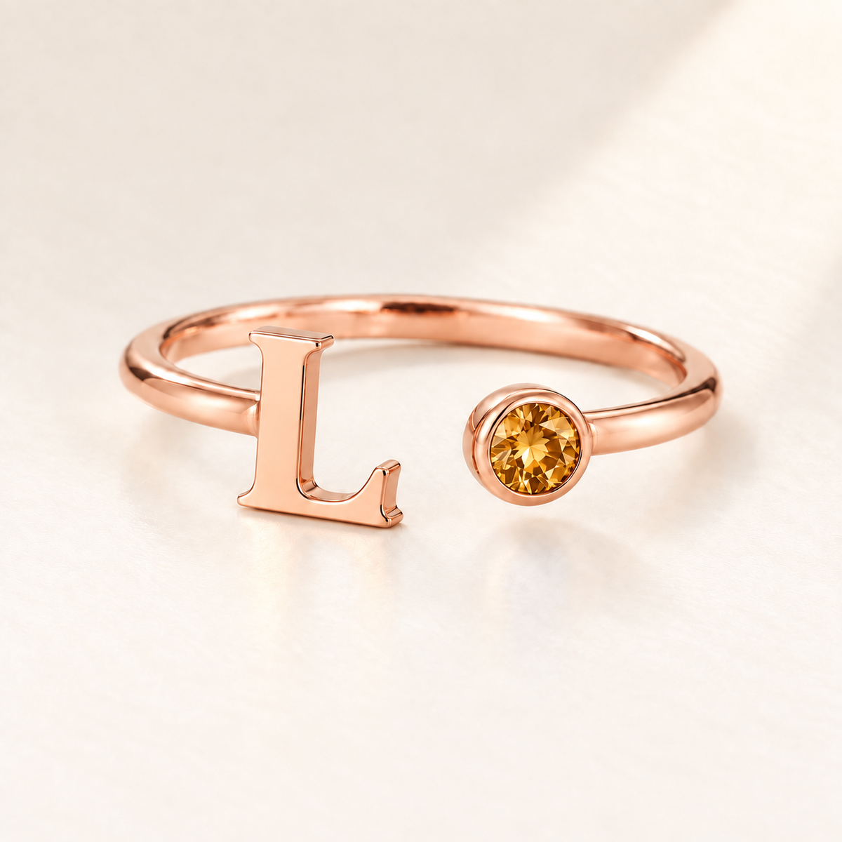 Custom Open Birthstone Initial Ring, rose gold november birthstone variant image; ivory background