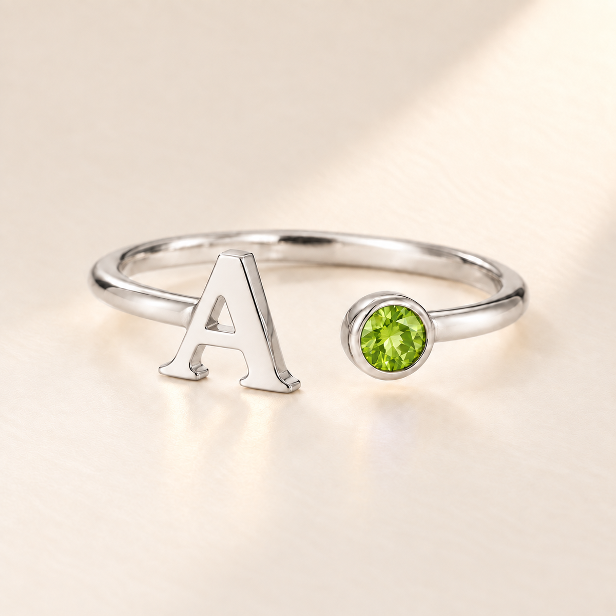 Custom Open Birthstone Initial Ring, silver august birthstone variant image; ivory background
