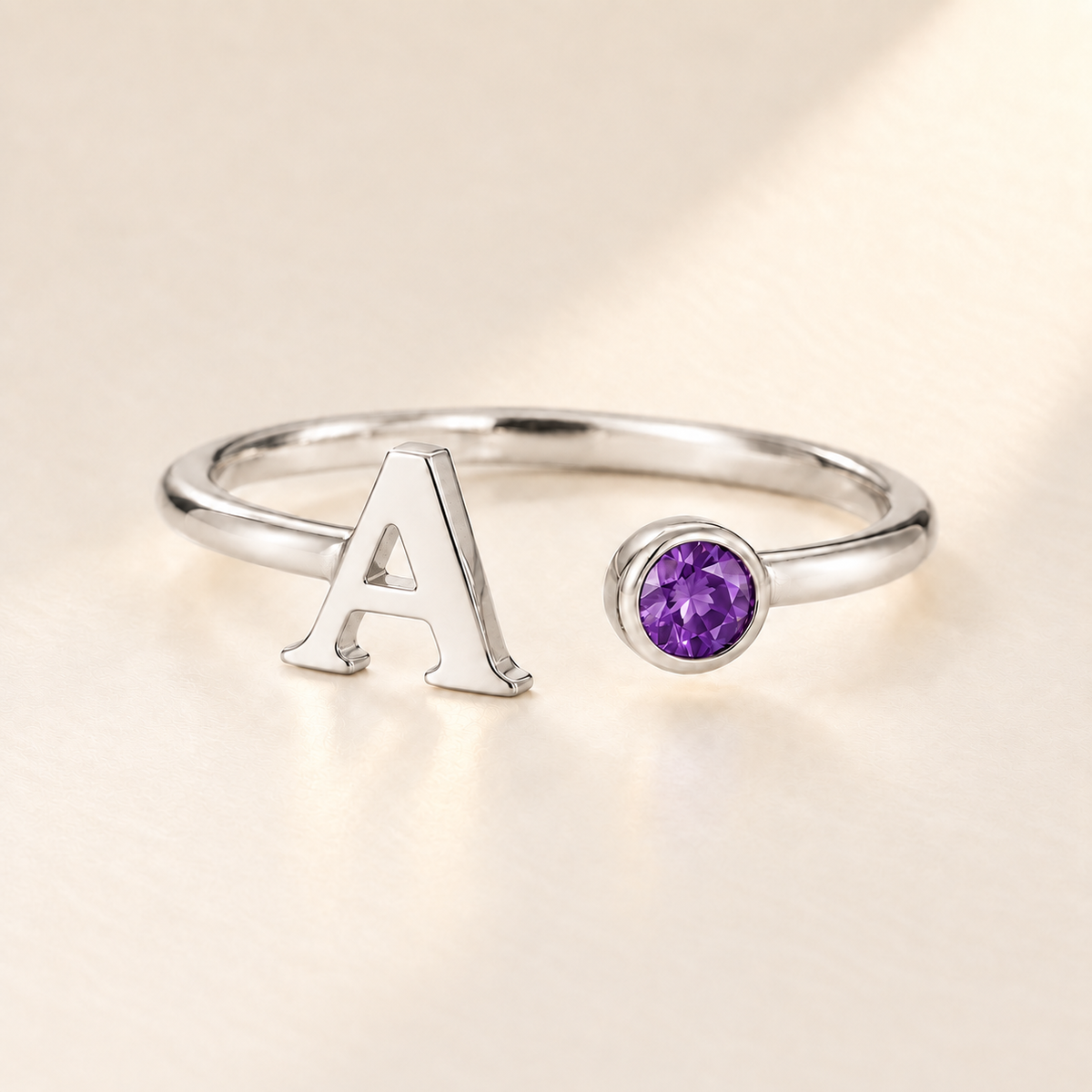 Custom Open Birthstone Initial Ring, silver february birthstone variant image; ivory background