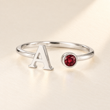Custom Open Birthstone Initial Ring, silver-january birthstone variant image; ivory background