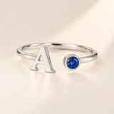Custom Open Birthstone Initial Ring, silver september birthstone variant image; ivory background