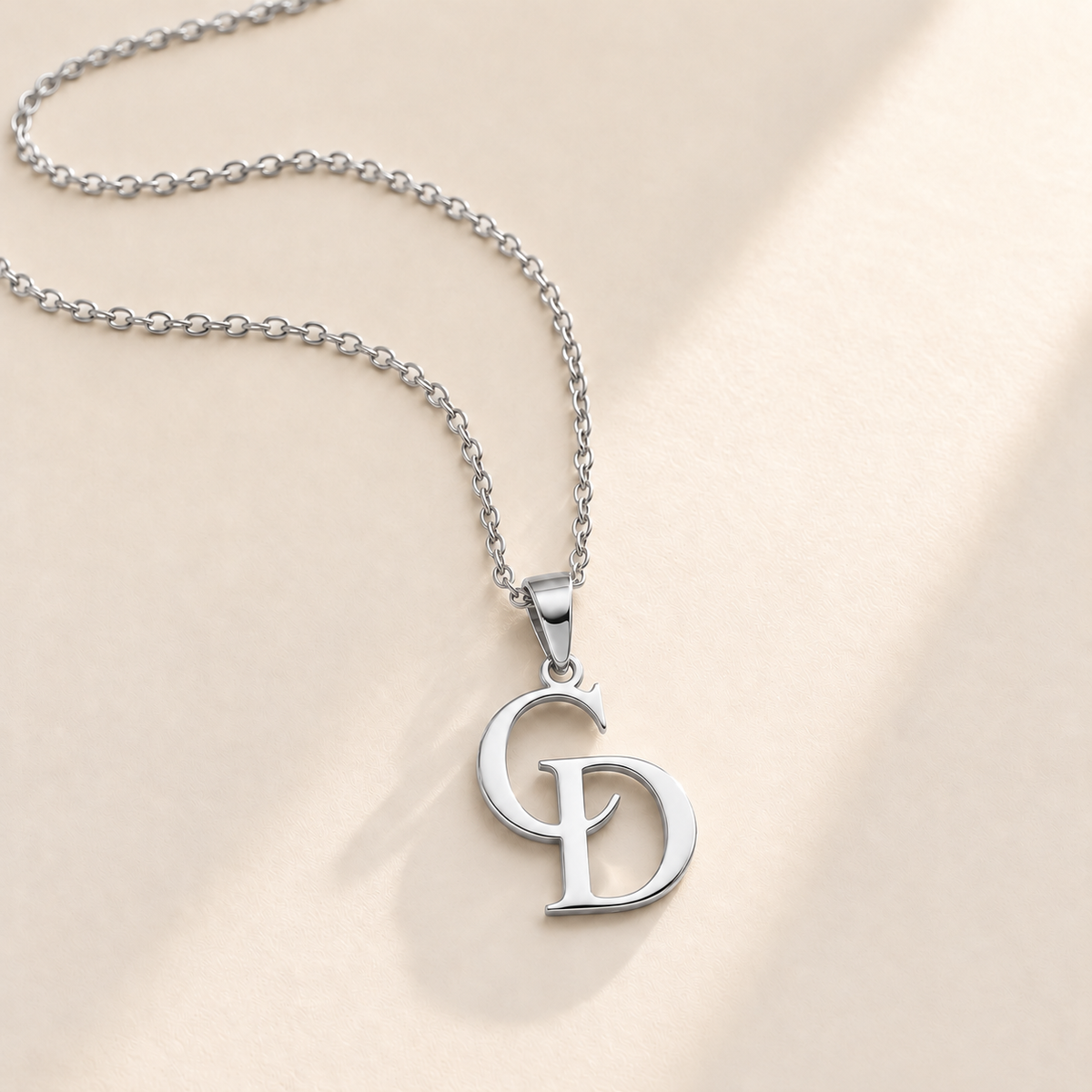 Custom Overlapping Initials Necklace silver hero photo - silver C and D serif initials pendant on a fine cable chain Anthology Jewelry