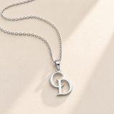 Custom Overlapping Initials Necklace silver hero photo - silver C and D serif initials pendant on a fine cable chain Anthology Jewelry