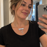 Custom Pavé Nameplate Drop Necklace in silver with Eva personalization, candid worn view - Anthology Jewelry