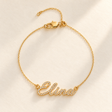 Gold pavé script name bracelet with original Elina sample on fine cable chain