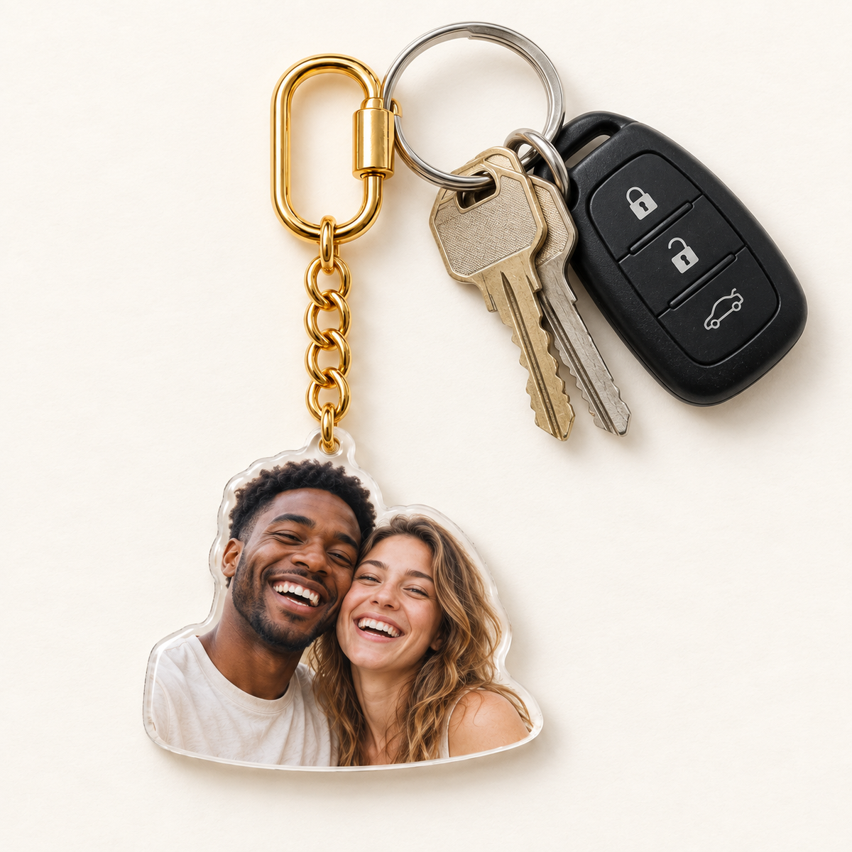 Gold custom couple photo charm attached to house and car keys