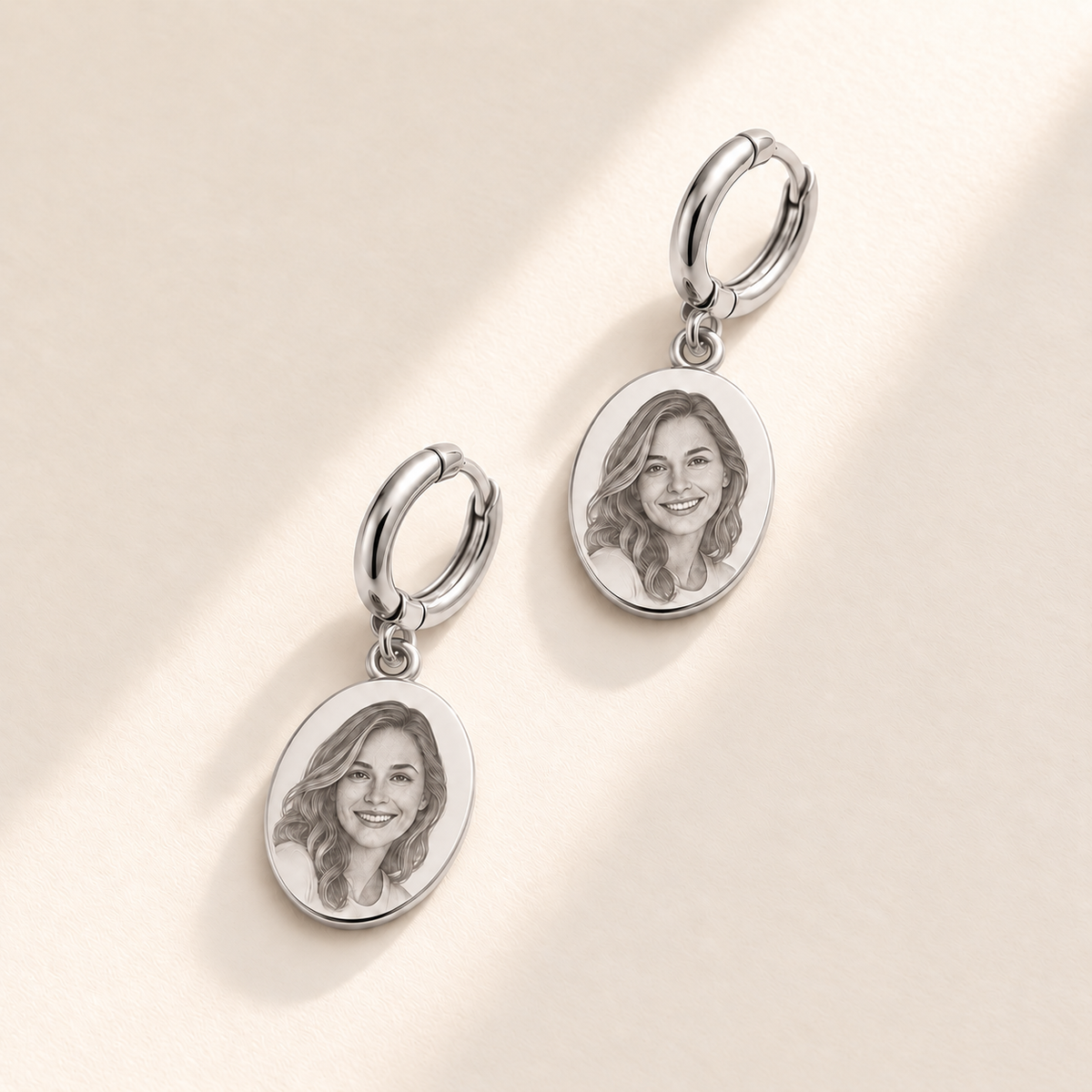 Custom Photo Engraved Oval Drop Earrings hero photo - silver oval drop earrings with engraved portrait charms Anthology Jewelry