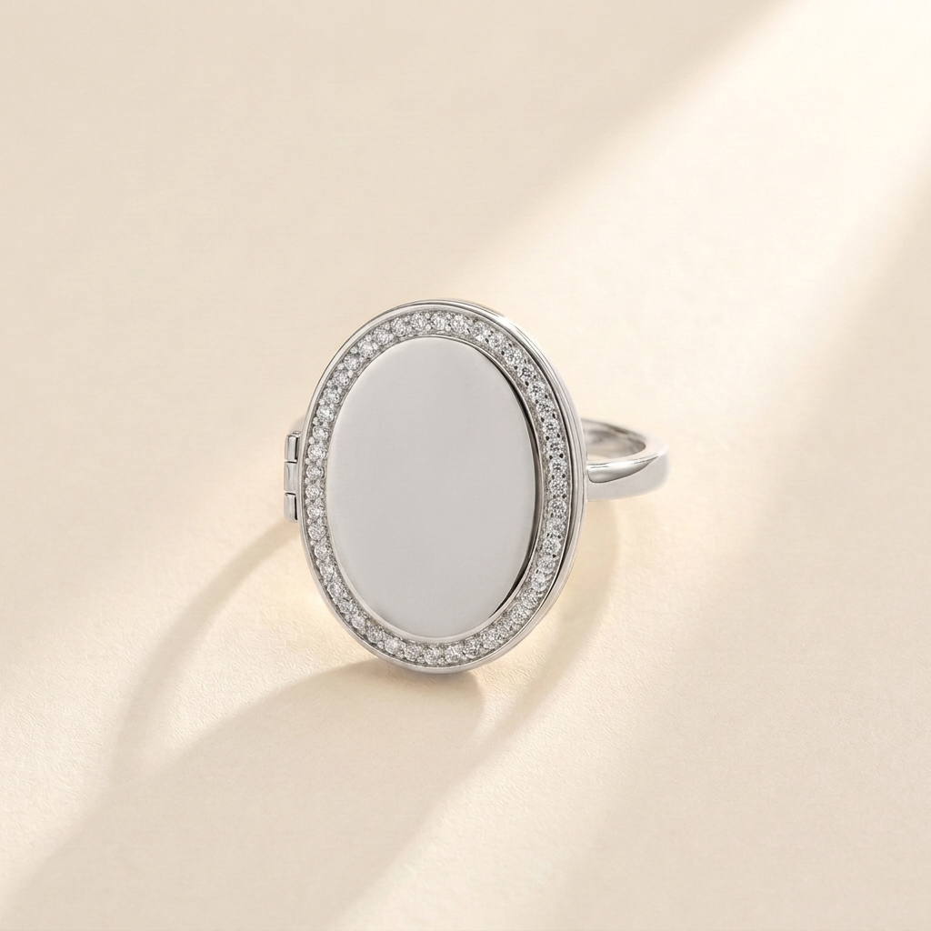 Custom Photo Locket Ring hero photo - silver oval hinged locket ring with pave crystal border and blank polished face Anthology Jewelry