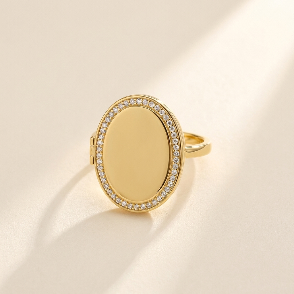 Custom Photo Locket Ring hero photo - gold oval hinged locket ring with pave crystal border and blank polished face Anthology Jewelry