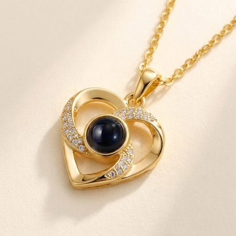 Custom Photo Necklace Swirl Heart Pendant detail photo - close-up of interlocking ribbons and photo projection stone Anthology Jewelry
