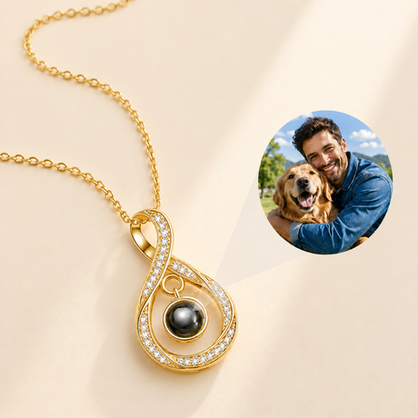 Custom Photo Necklace Teardrop Infinity Pendant hero photo - gold teardrop infinity pendant with photo projection stone on cream background Anthology Jewelry