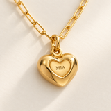 Custom Puffy Heart Necklace detail photo - macro of the small engraved heart inside the rounded heart pendant Anthology Jewelry
