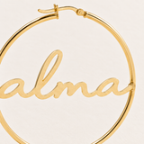 Custom Script Name Hoop Earrings detail photo - macro of lowercase script name spanning the open hoop Anthology Jewelry