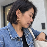 Custom Script Name Hoop Earrings in Rose Gold, candid phone-style marketing image with ella lowercase cutout name - Anthology Jewelry