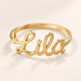 Custom Script Name Ring detail photo - macro of a cutout cursive name connected to the ring shoulders Anthology Jewelry