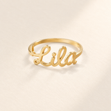 Custom Script Name Ring hero photo - gold ring with Lila name sculpted across the front Anthology Jewelry