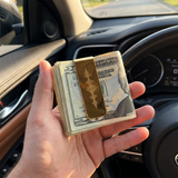 Custom Soundwave Money Clip UGC photo - gold money clip holding folded cash in car Anthology Jewelry