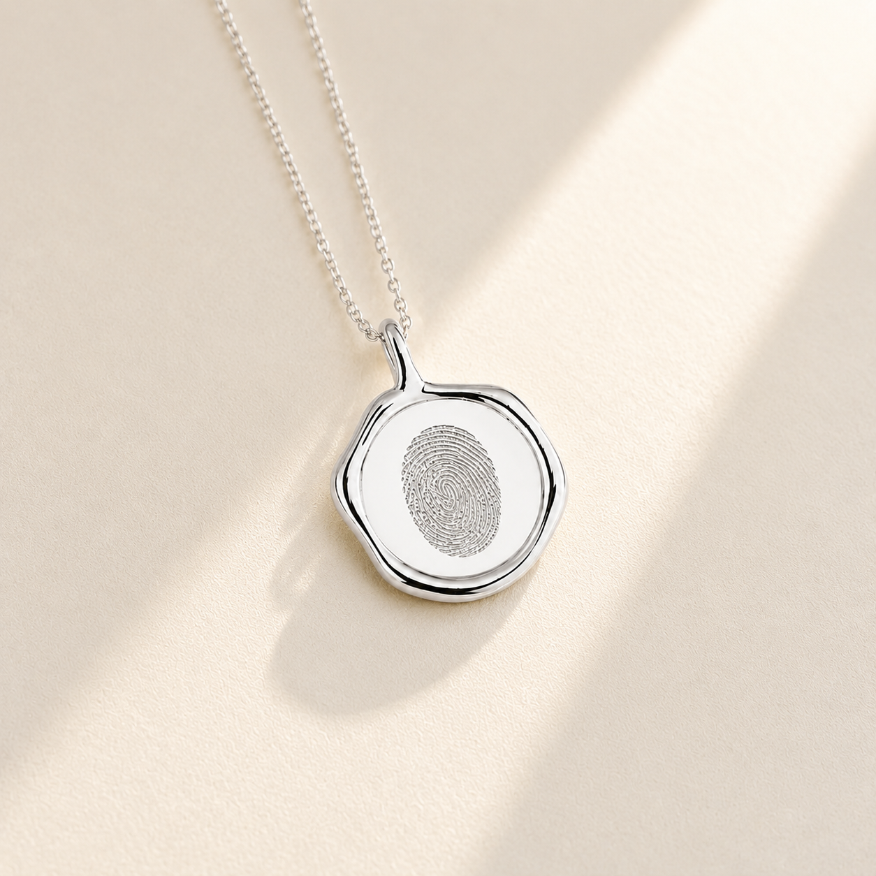 Custom Stamp Necklace close up detail - engraved fingerprint stamp necklace Anthology Jewelry
