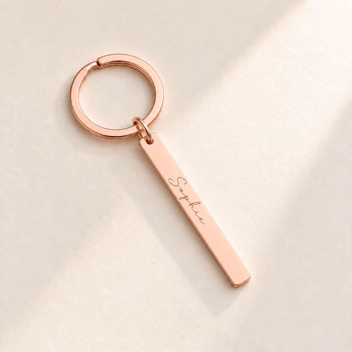 Custom Vertical Bar Keychain rose gold hero photo - Sophie handwriting engraving Anthology Jewelry