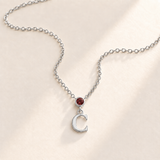 Custom Vertical Birthstone Initial Necklace january silver birthstone photo - round inline stone with hanging serif C Anthology Jewelry