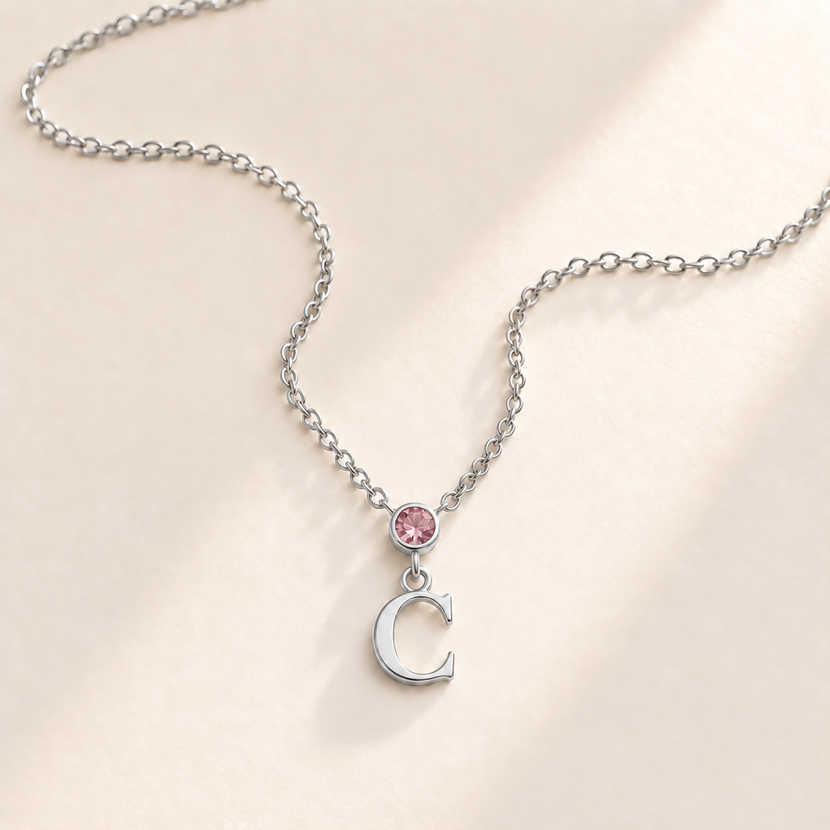 Custom Vertical Birthstone Initial Necklace october silver birthstone photo - round inline stone with hanging serif C Anthology Jewelry