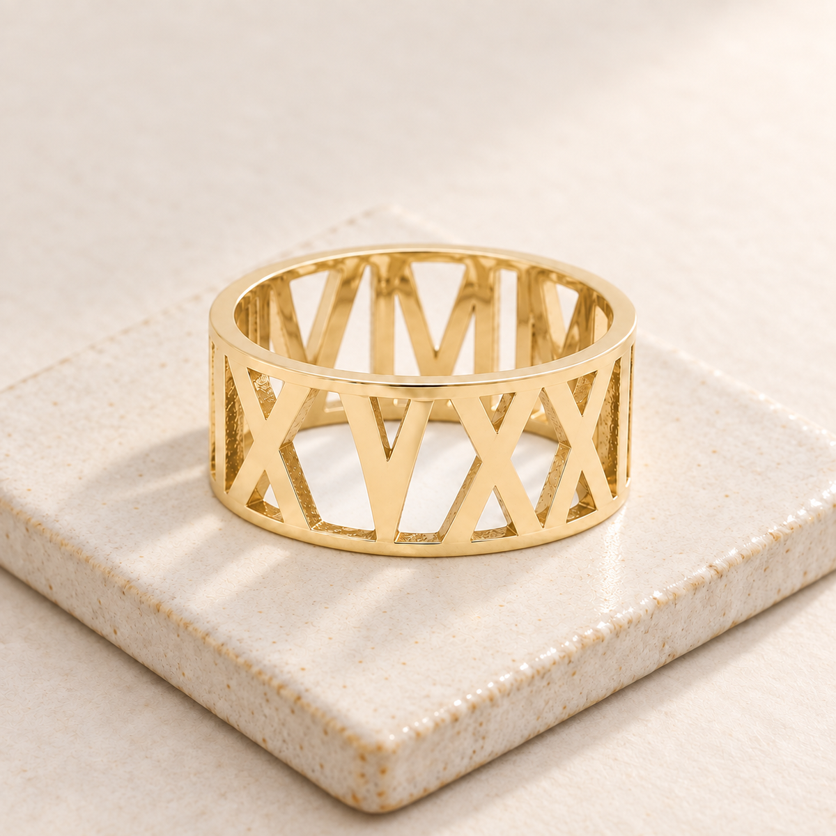 Custom Wide Cut Out Ring glamour photo - gold openwork band on ivory ceramic tile Anthology Jewelry