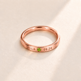 Custom Date & Name Birthstone Stacking Ring, August Peridot, Rose Gold finish. Illustrative product rendering; natural gemstone colors may vary.