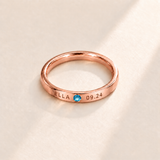 Custom Date & Name Birthstone Stacking Ring, December Blue Topaz, Rose Gold finish. Illustrative product rendering; natural gemstone colors may vary.