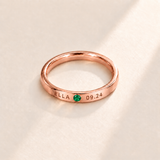 Custom Date & Name Birthstone Stacking Ring, May Emerald, Rose Gold finish. Illustrative product rendering; natural gemstone colors may vary.