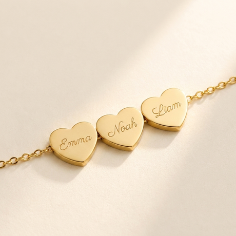 Generations Heart Necklace detail photo - close-up of engraved heart charms Anthology Jewelry
