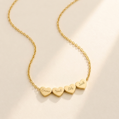 Generations Heart Necklace hero photo - gold multi-heart necklace engraved with Emma, Noah, Lily and Jack Anthology Jewelry