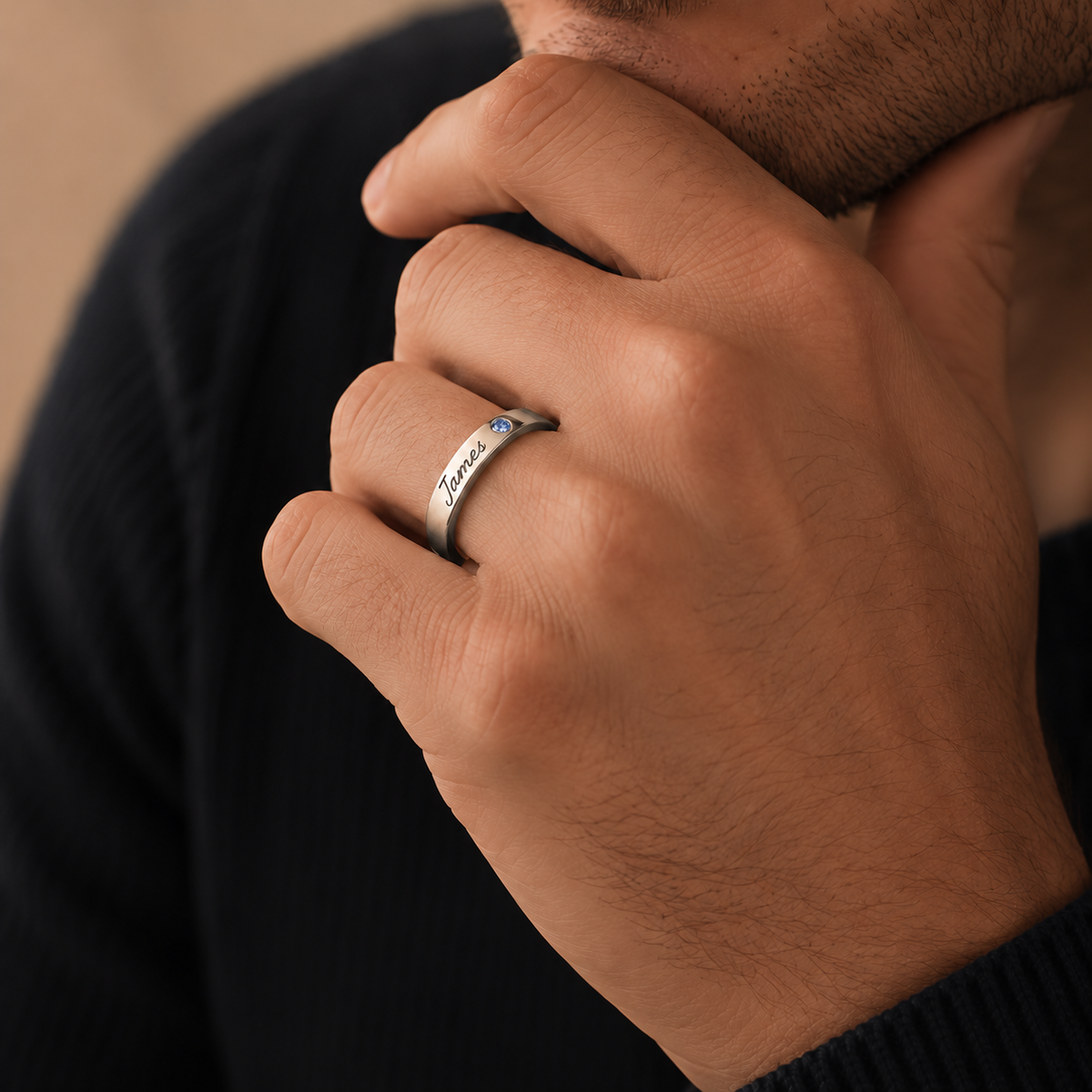Name Ring with Birthstone (Classic Band) lifestyle photo - silver James name ring with blue birthstone worn by a man Anthology Jewelry