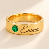 Custom Wide Band Name Ring with Birthstone detail photo - gold Emma engraving and May emerald closeup of the 8 mm wide band Anthology Jewelry