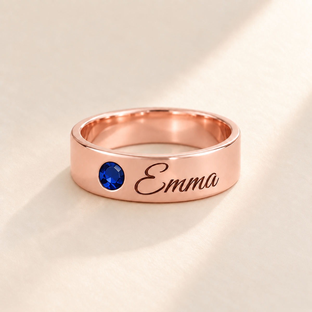 Custom Wide Band Name Ring with Birthstone variant photo - rose gold September Sapphire birthstone and Emma engraving Anthology Jewelry