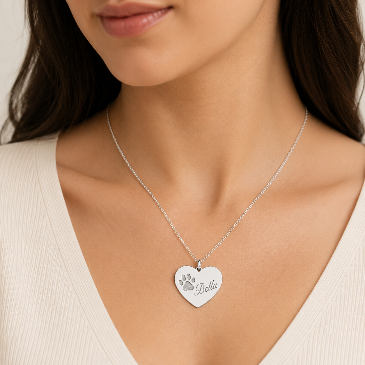 Paw print heart necklace lifestyle - personalized pet memorial jewelry Anthology